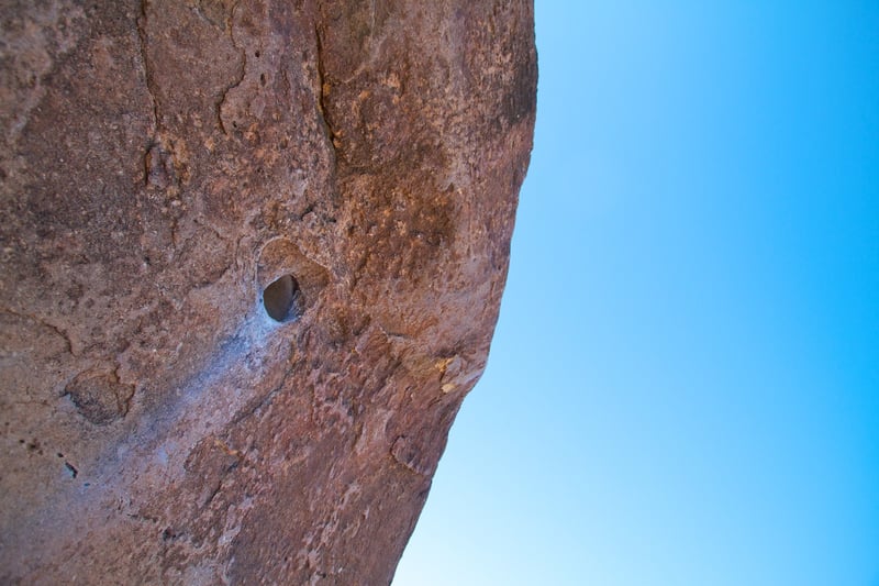 Wonderhole, a single-move bouldering problem in Hueco Tanks.